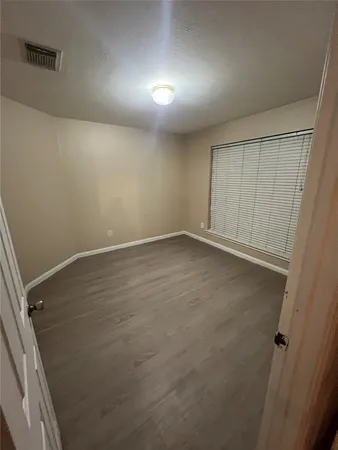 an empty room with a workbench