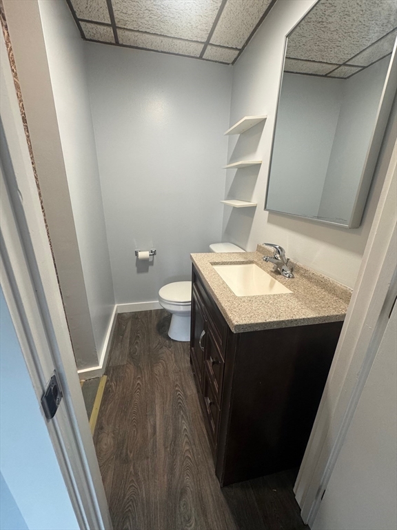 353 Cabot Street, Unit 1 Beverly, MA 01915 - Photo 13 of 18 a bathroom with a sink and a mirror