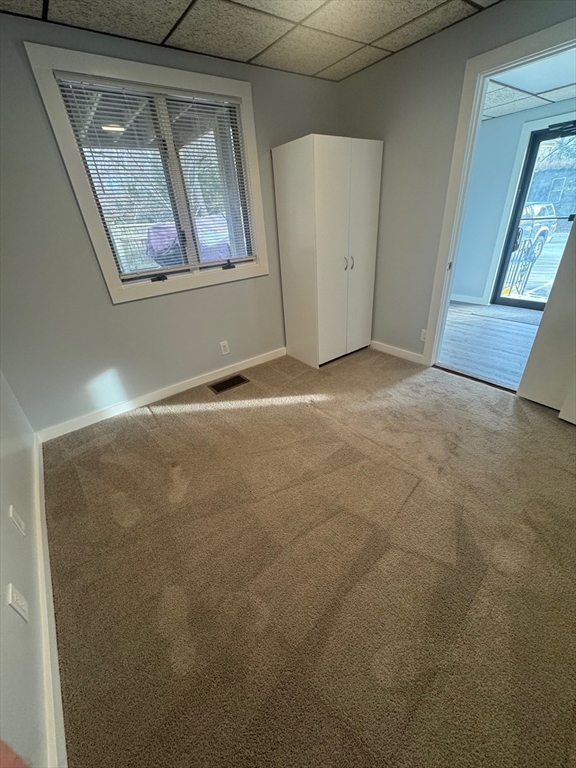 353 Cabot Street, Unit 1 Beverly, MA 01915 - Photo 15 of 18 a view of an empty room with a window