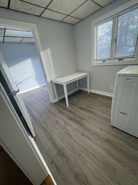 353 Cabot Street, Unit 1 Beverly, MA 01915 - Photo 18 of 18 a view of a room with wooden floor and window
