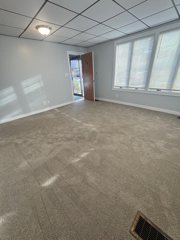 353 Cabot Street, Unit 1 Beverly, MA 01915 - Photo 4 of 18 a view of an empty room with a window