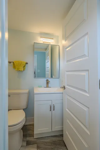 a big house with a big yard and large trees