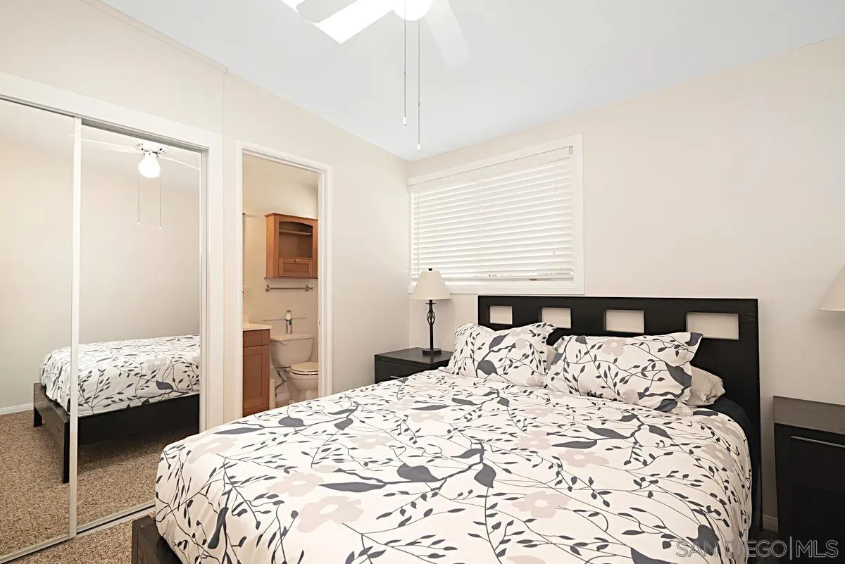 13836 Powers Road Poway, CA 92064 - Photo 19 of 27 a bedroom with a bed and a dresser