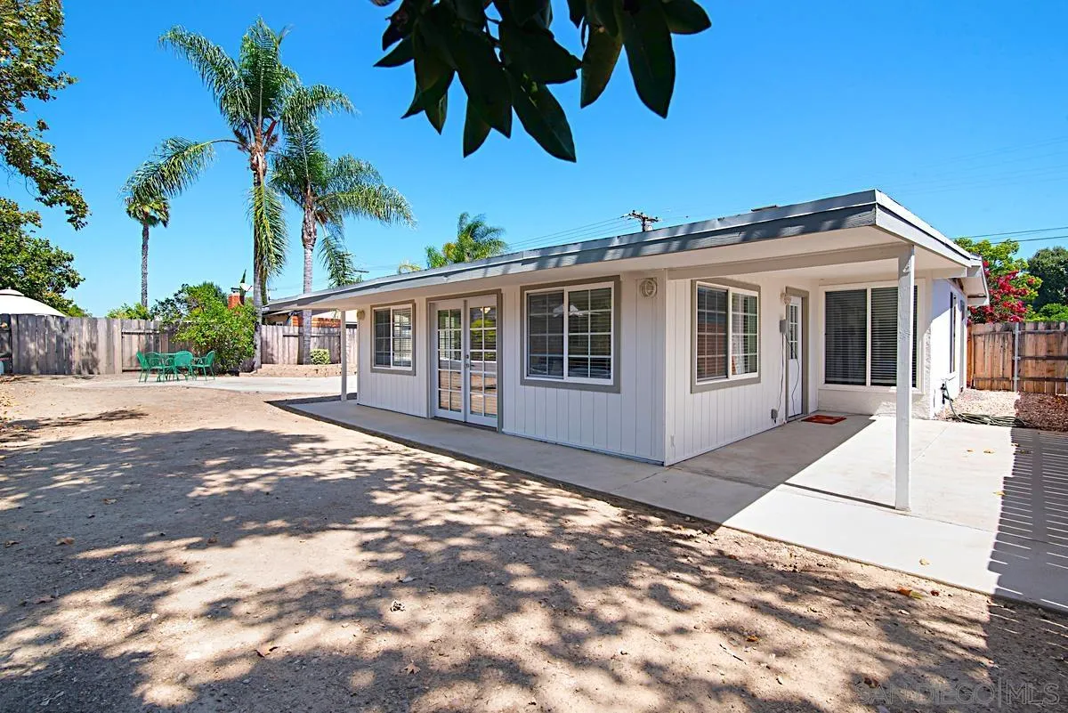 13836 Powers Road Poway, CA 92064 - Photo 25 of 27 a view of a house with a yard
