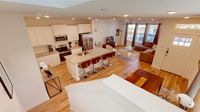 a view of a living room with furniture