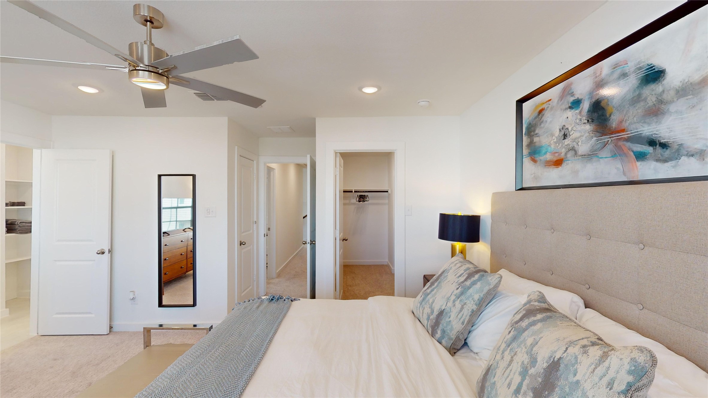 2906 ELLE Drive Grand Prairie, TX 75052 - Photo 25 of 47 a bedroom with a bed and a painting on the wall