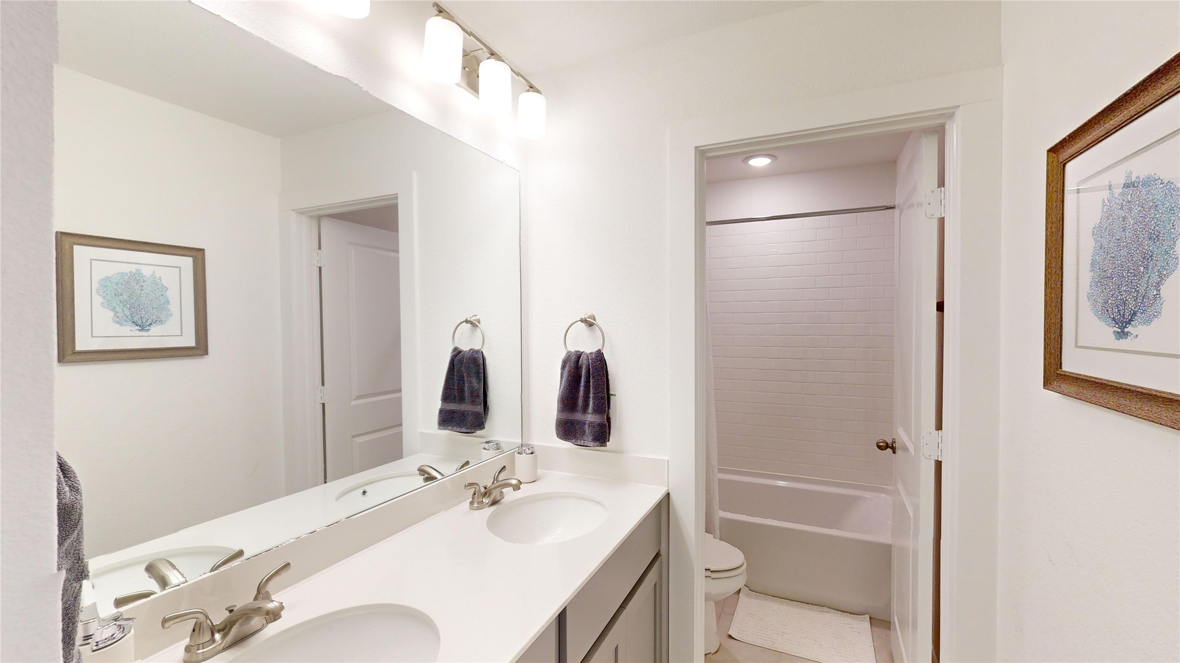 2906 ELLE Drive Grand Prairie, TX 75052 - Photo 38 of 47 a bathroom with a granite countertop sink toilet and shower