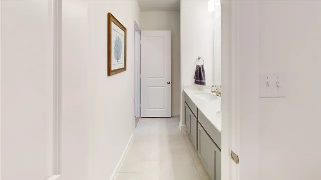 a bathroom with a toilet and a sink