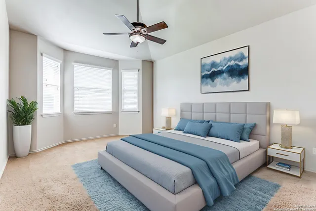 a bedroom with bed and window