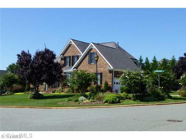307 Georgetowne Drive Elon, NC 27244 - Photo 2 of 16 Exterior Front. Corner lot with oversized 2-car garage, irrigation system, and landscape lighting