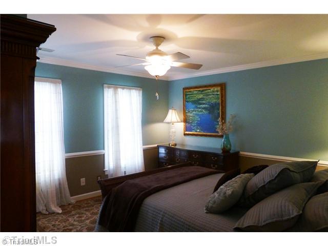 307 Georgetowne Drive Elon, NC 27244 - Photo 13 of 16 3rd Bedroom. Bedroom 3 is on the second level with a large double closet