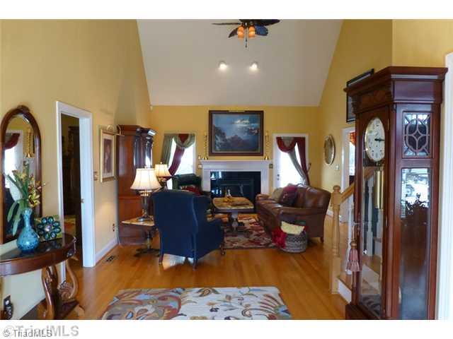 307 Georgetowne Drive Elon, NC 27244 - Photo 3 of 16 Entry. Hardwoods throughout with the foyer opening to a 2-story family room; dining to the right; living room/office to the left