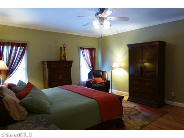 307 Georgetowne Drive Elon, NC 27244 - Photo 10 of 16 Master Bedroom. Spacious 1st floor master suite with windows overlooking the rear pool