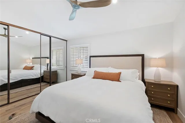 a view of a workspace with furniture and a bathroom