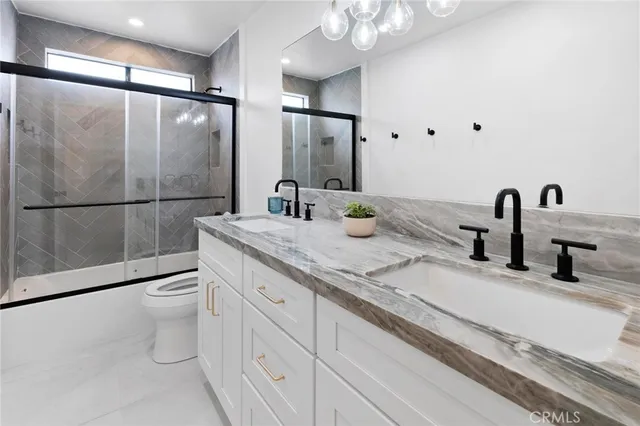 a bedroom with a bed and a closet