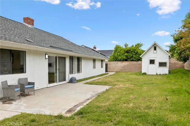 a view of a backyard with a garden