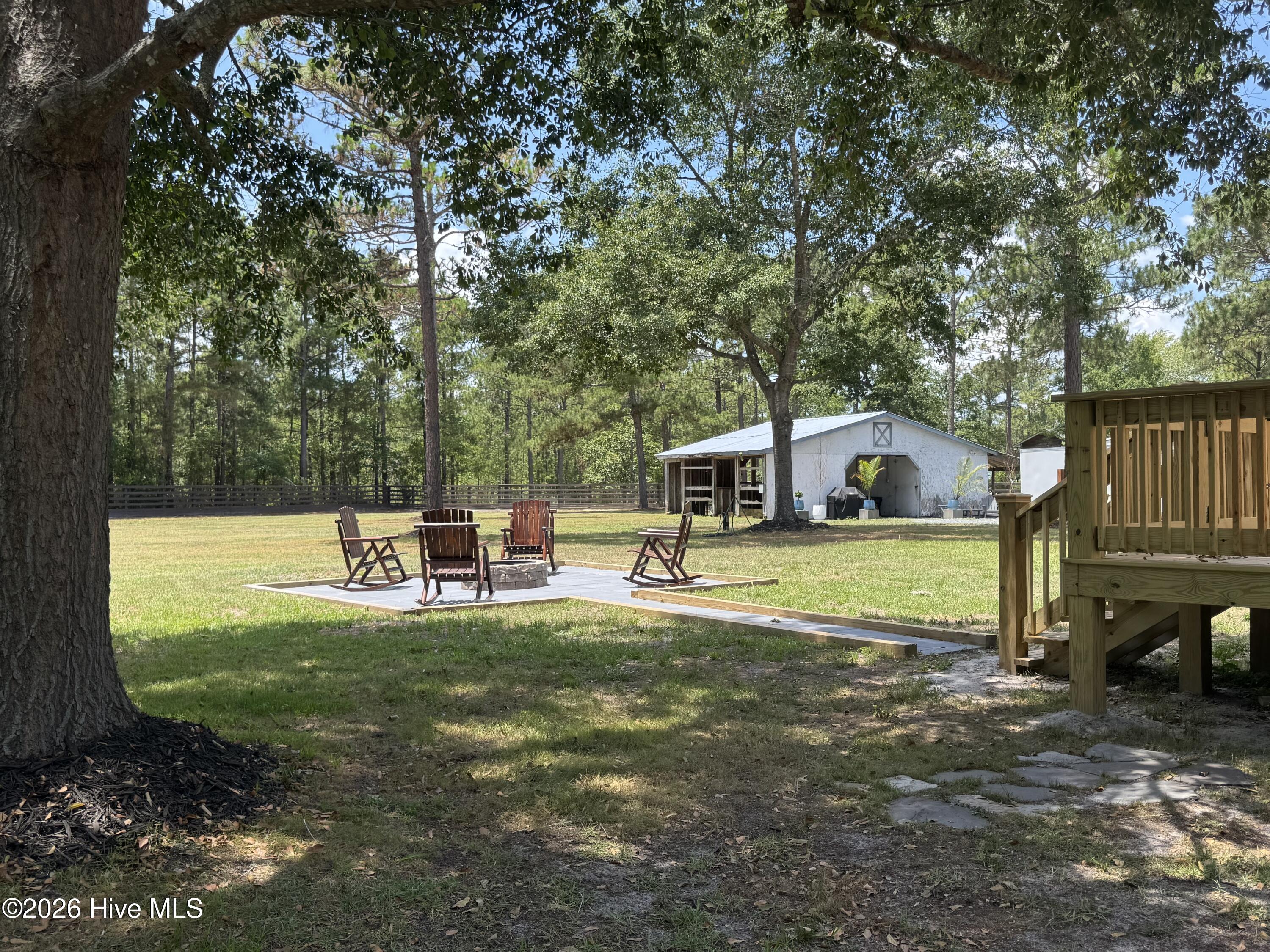 1265 Gilbert Road Southeast Bolivia, NC 28422 - Photo 5 of 46 Grand oak trees provide the perfect amount of shade