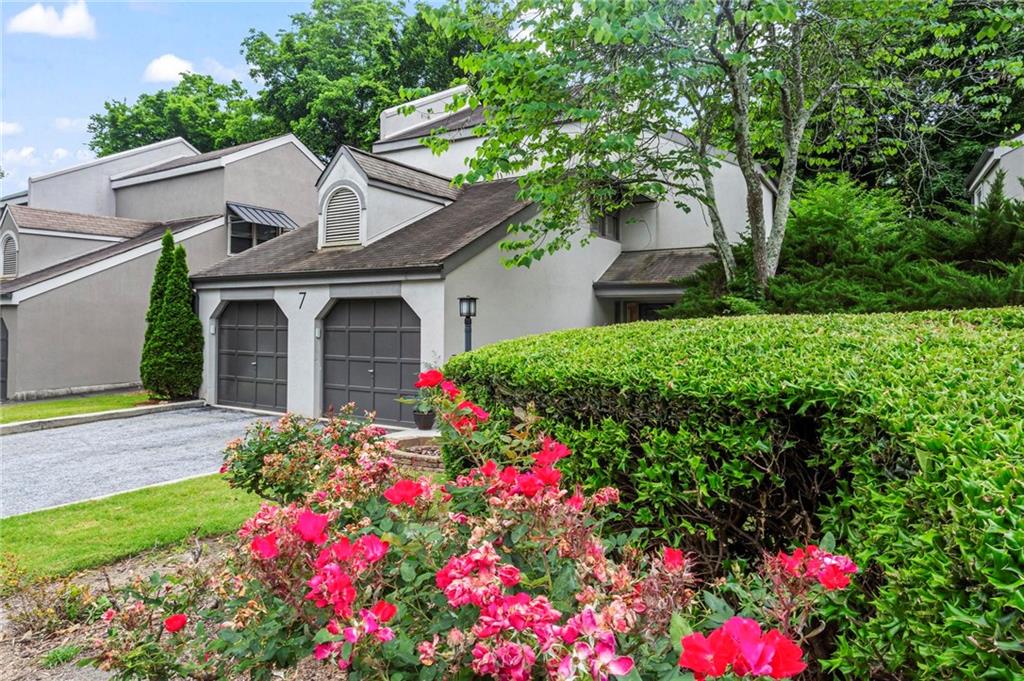 2914 Lenox Road Northeast, Unit 7 Atlanta, GA 30324 - Photo 1 of 1 a house view with a garden space