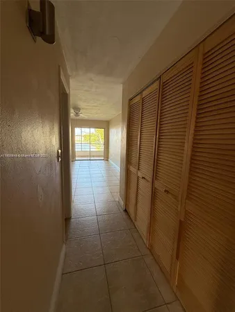 a bathroom with a glass door shower