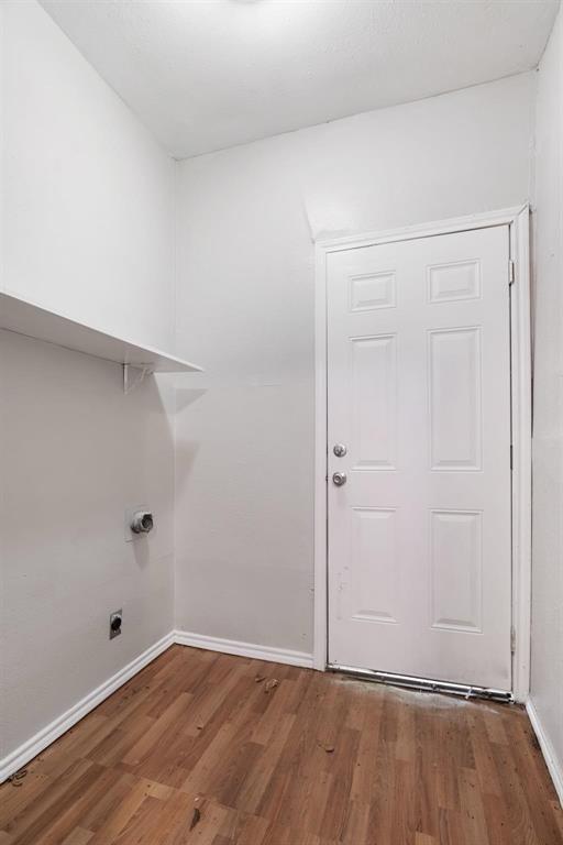 1358 Bonham Street Paris, TX 75460 - Photo 10 of 19 wooden floor in an empty room
