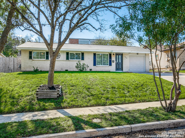 710 Wayside Drive San Antonio, TX 78213 - Photo 1 of 1 a front view of a house with a yard and large tree