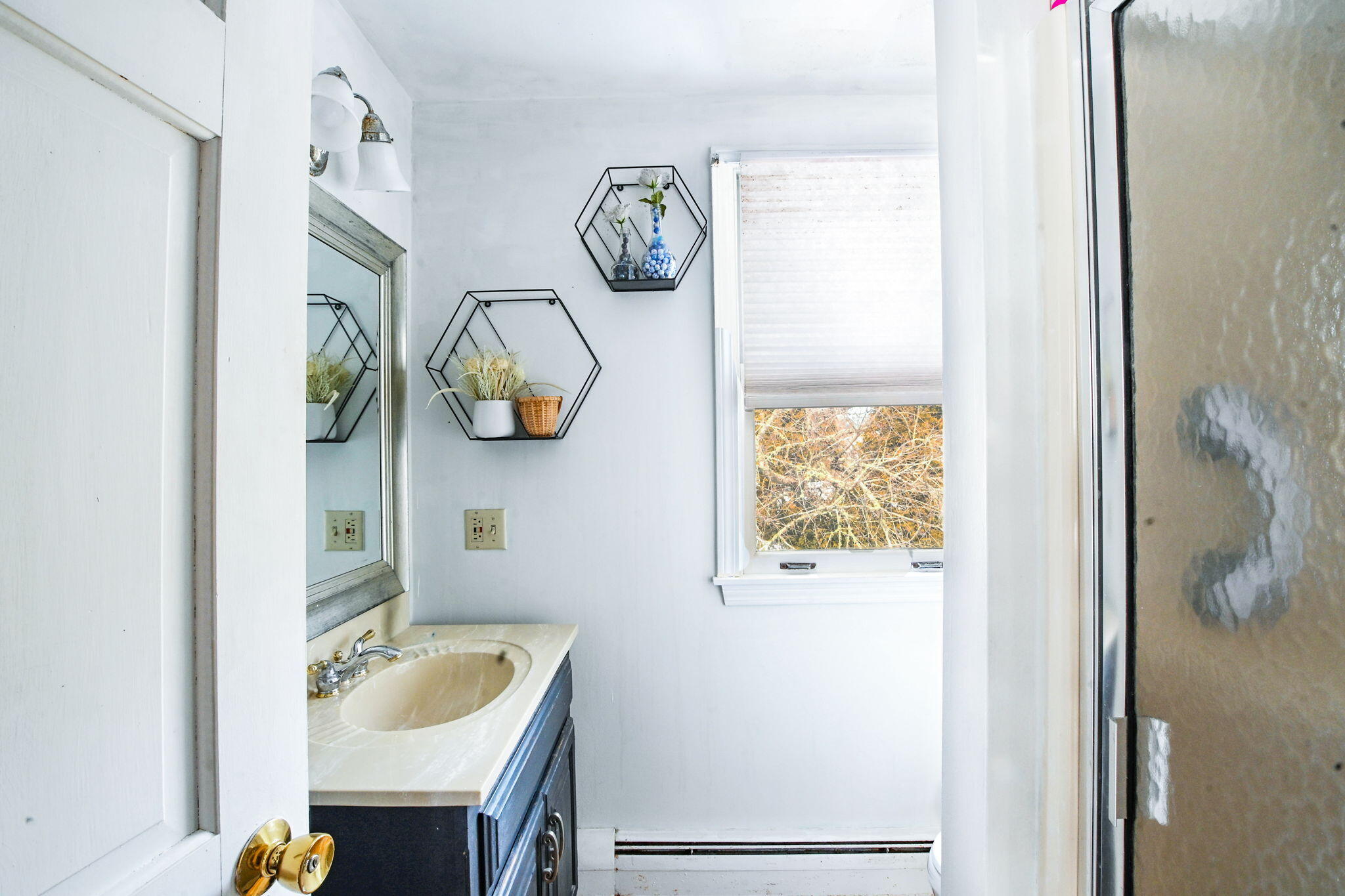 22 Winsome Road South Yarmouth, MA 02664 - Photo 24 of 30 a bathroom with a granite countertop sink and a mirror
