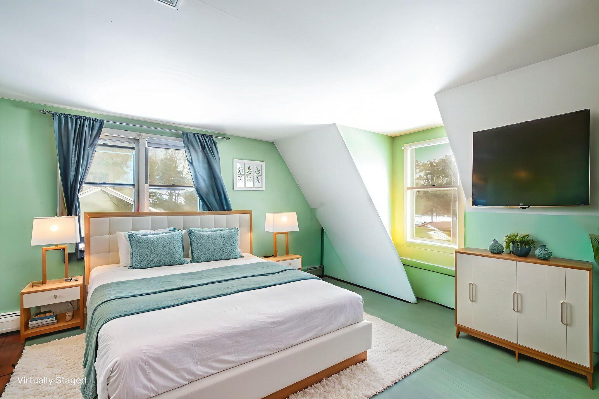 22 Winsome Road South Yarmouth, MA 02664 - Photo 26 of 30 a bedroom with a bed and a flat screen tv