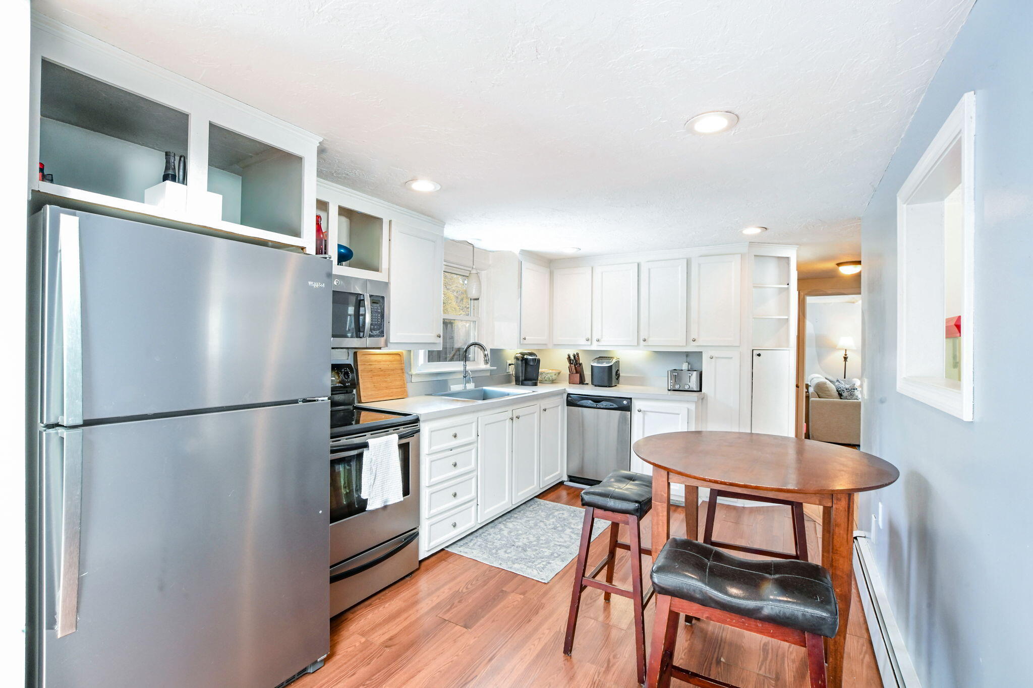 22 Winsome Road South Yarmouth, MA 02664 - Photo 9 of 30 a kitchen with stainless steel appliances refrigerator stove microwave and dining table