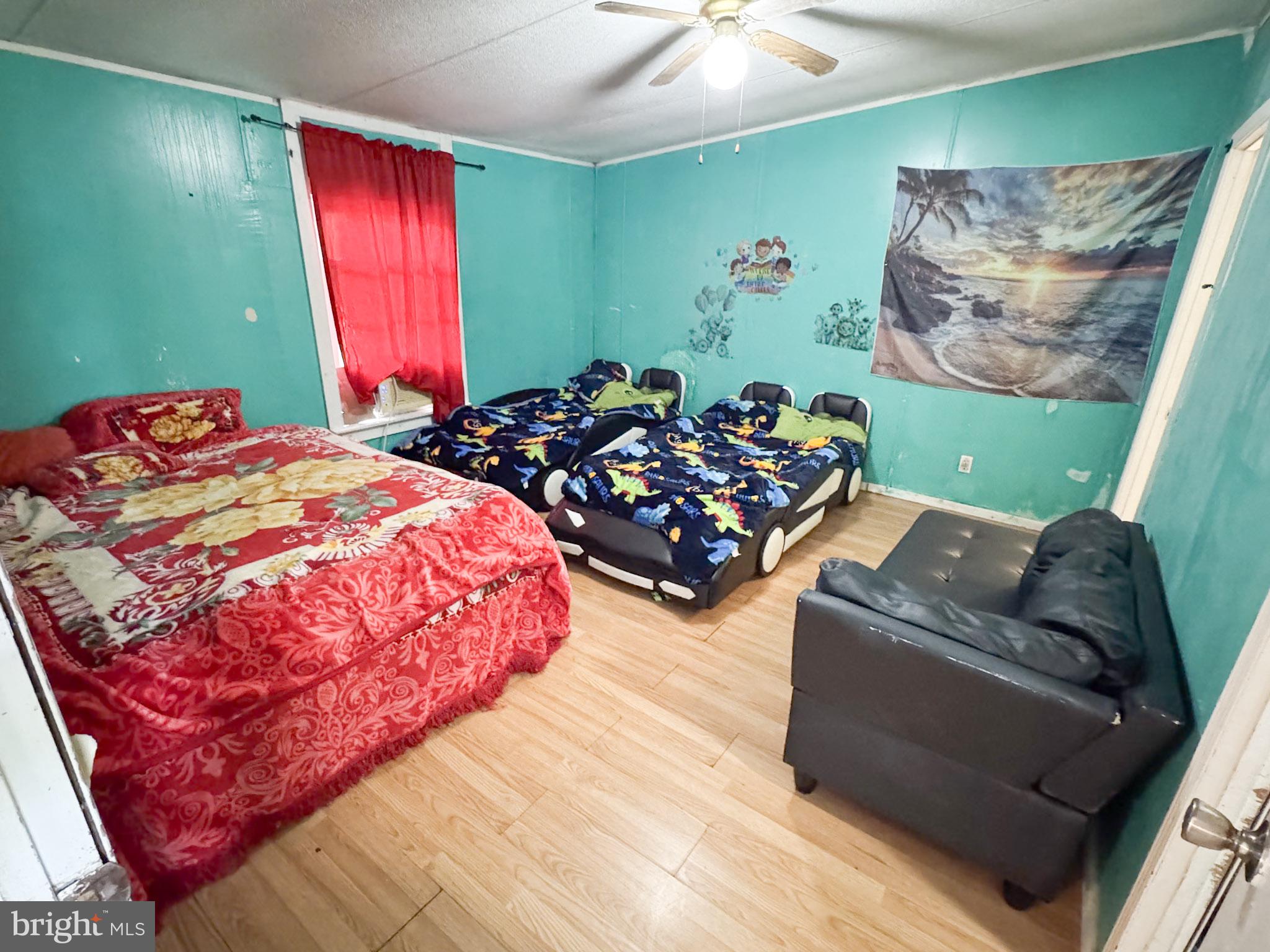 4512 Woodpecker Road Seaford, DE 19973 - Photo 18 of 32 Vibrant bedroom with playful decor.