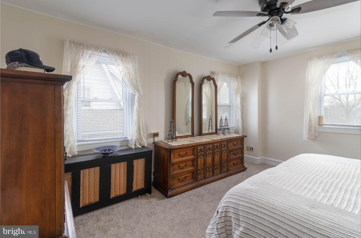 412 Oxford Road Havertown, PA 19083 - Photo 20 of 30 a spacious bathroom with double vanity and a mirror