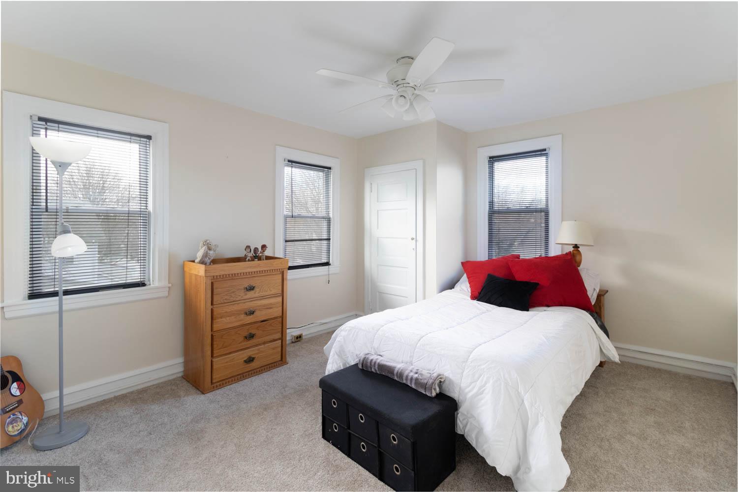 412 Oxford Road Havertown, PA 19083 - Photo 24 of 30 a bedroom with a bed and a mirror