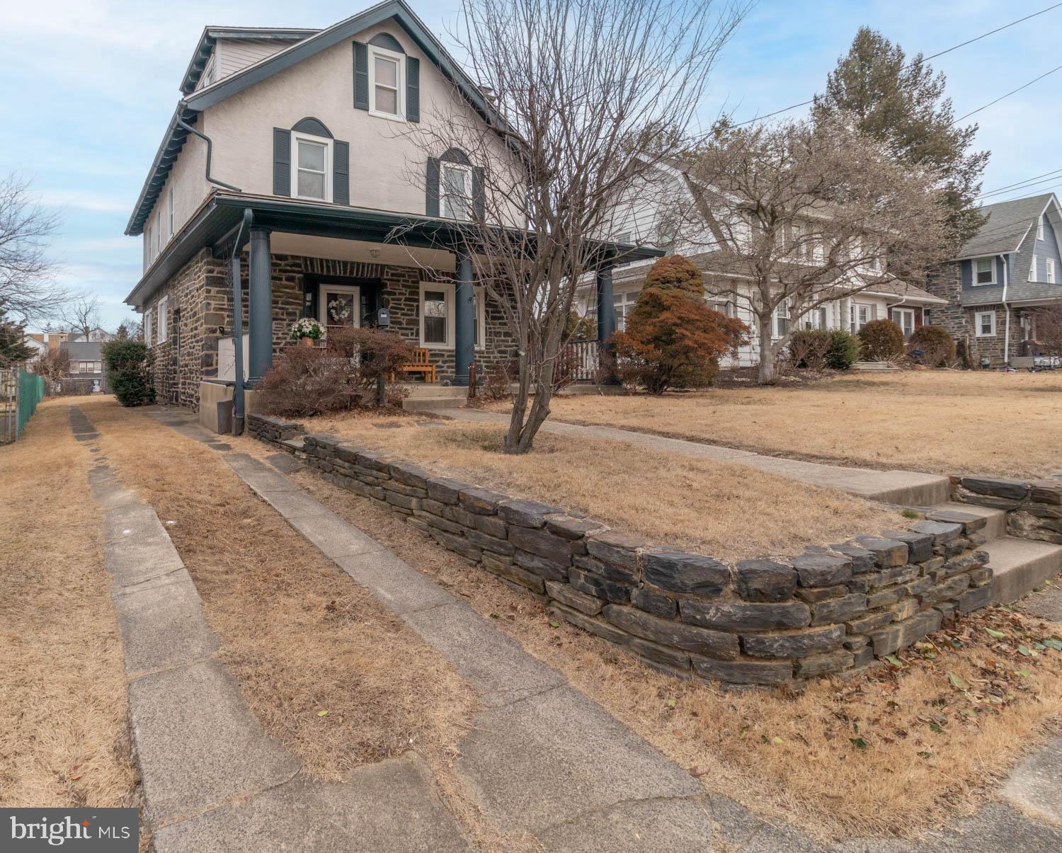 412 Oxford Road Havertown, PA 19083 - Photo 4 of 30 a front view of a house with garden
