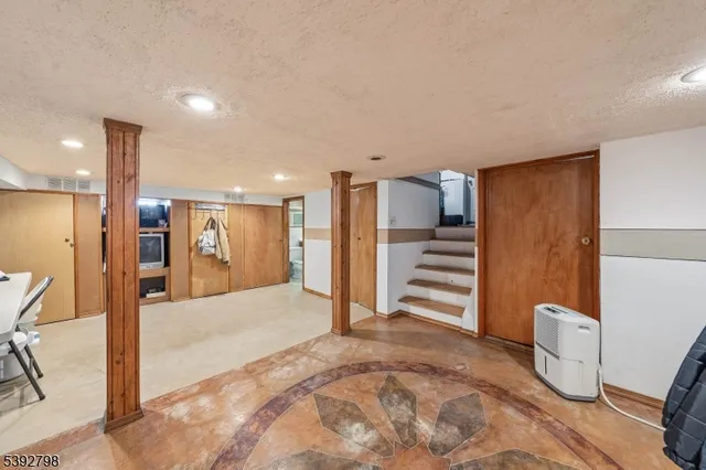 a view of a livingroom with a furniture