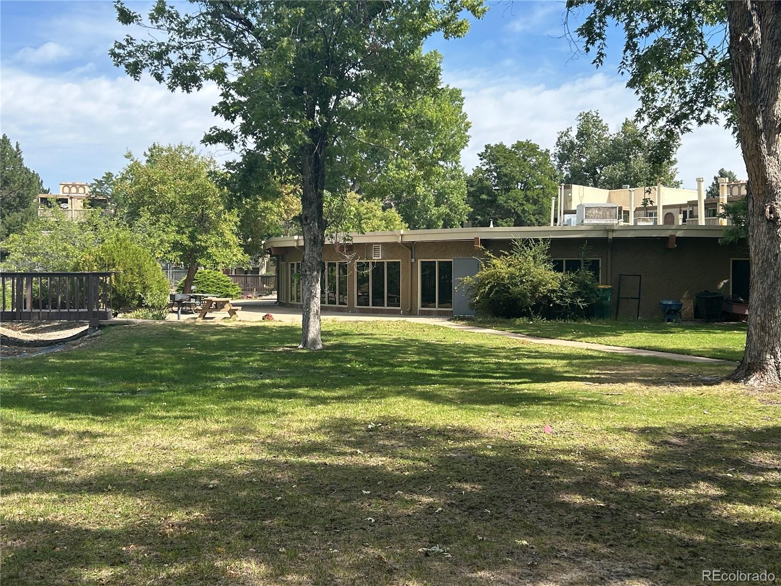 1306 South Parker Road, Unit 167 Denver, CO 80231 - Photo 19 of 26 a view of a house with a swimming pool