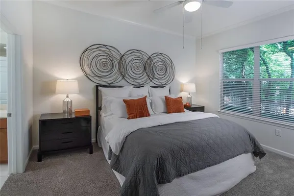 a bedroom with a bed and a closet