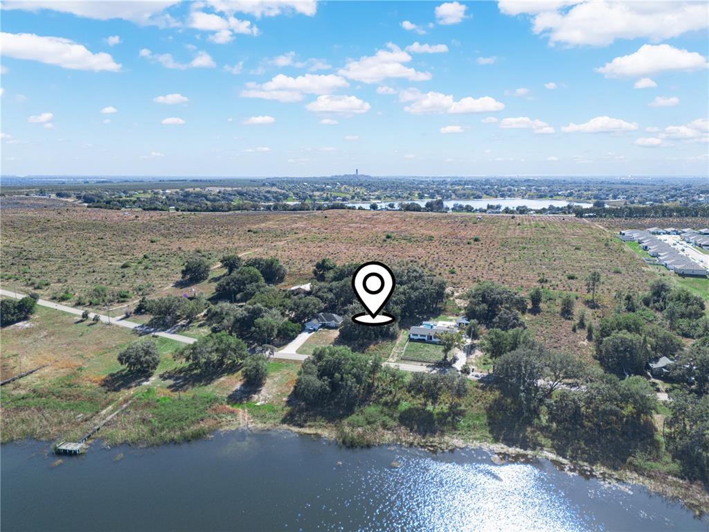 Lake Mabel Loop Road Lake Wales, FL 33898 - Photo 18 of 21 an aerial view of a house with a yard and lake view