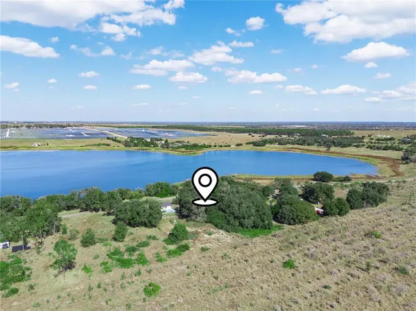 a view of a lake with a mountain in the back