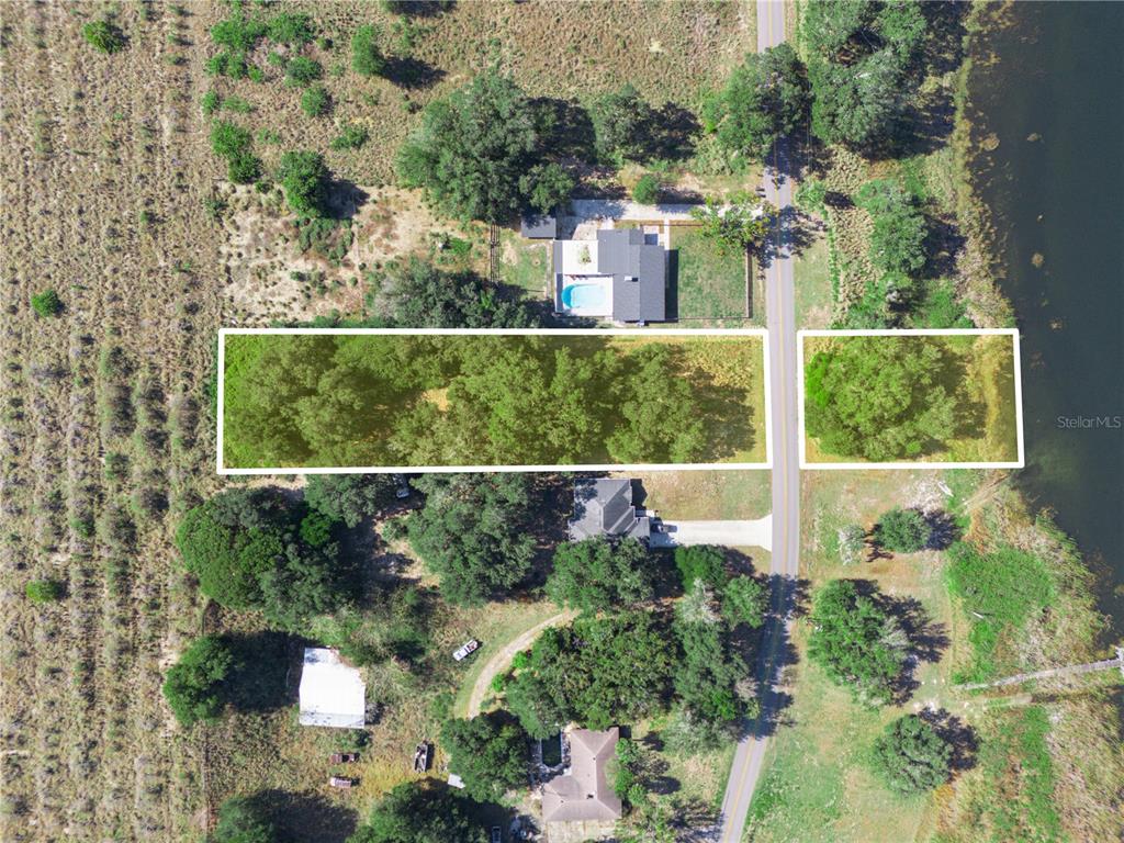 Lake Mabel Loop Road Lake Wales, FL 33898 - Photo 5 of 21 an aerial view of a house with a garden