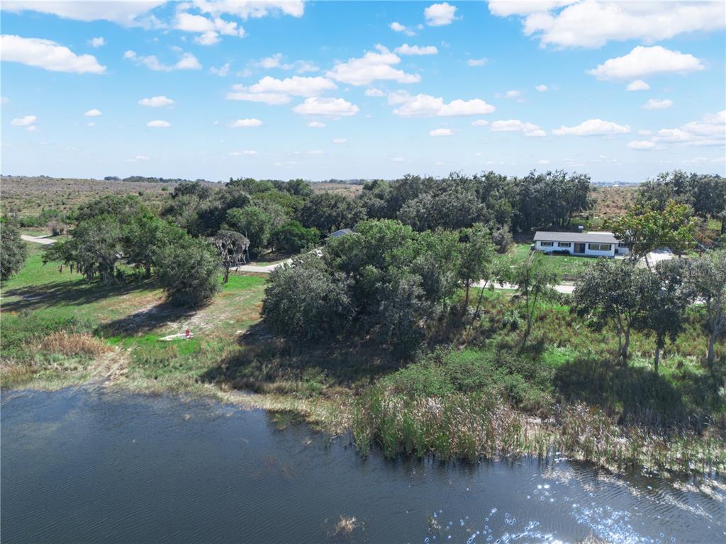 Lake Mabel Loop Road Lake Wales, FL 33898 - Photo 7 of 21 a view of a street with of trees