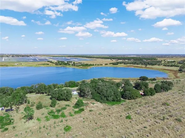 a view of an ocean and city