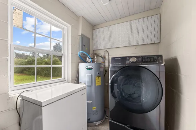 a utility room with dryer and washer