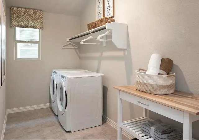 a kitchen with stainless steel appliances a stove a sink and a microwave