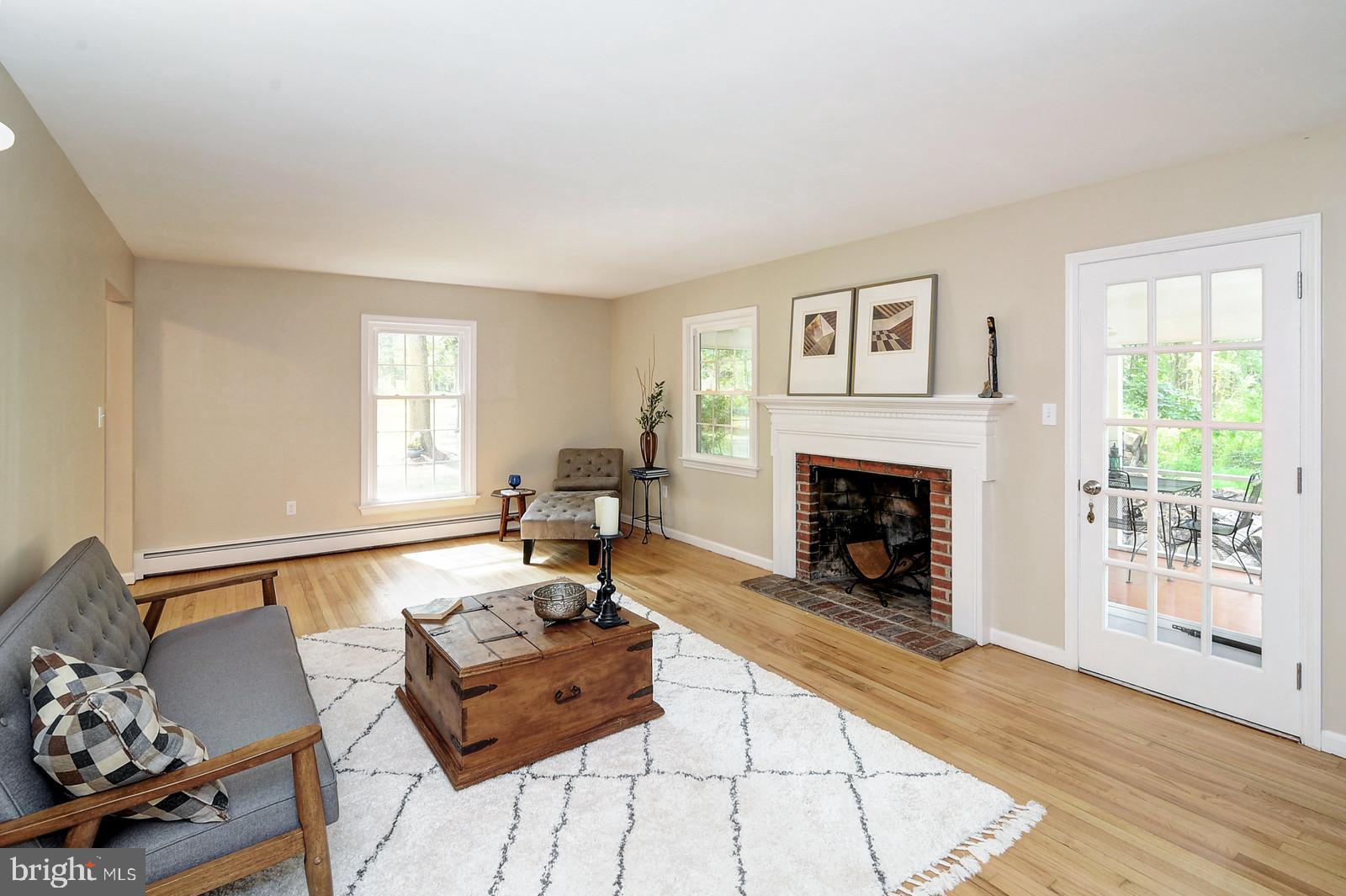 14 Cleveland Road West Princeton, NJ 08540 - Photo 7 of 40 Formal living room, fireplace and door to porch