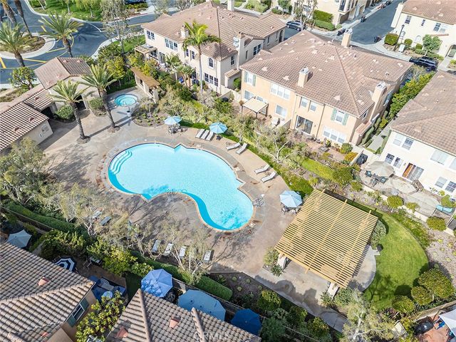 an aerial view of a house with outdoor space