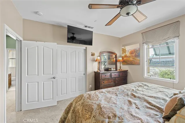 a spacious bathroom with a double vanity sink mirror and double