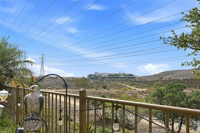 a view of a balcony with furniture