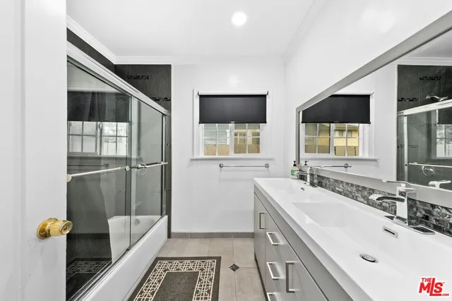 a bathroom with a sink and a bathtub