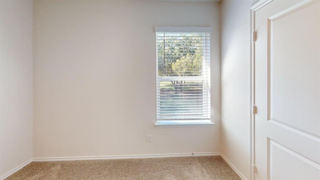 311 Clematis Street Princeton, TX 75407 - Photo 13 of 20 a view of a small space with a window