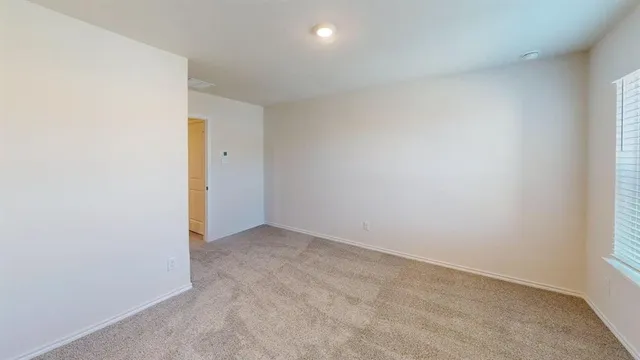 an entryway view with wooden floor