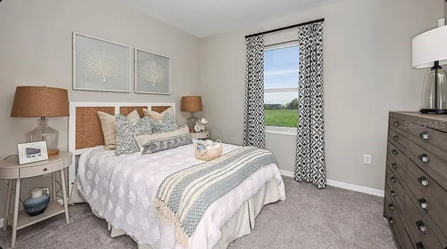 a bathroom with a double vanity sink mirror and double